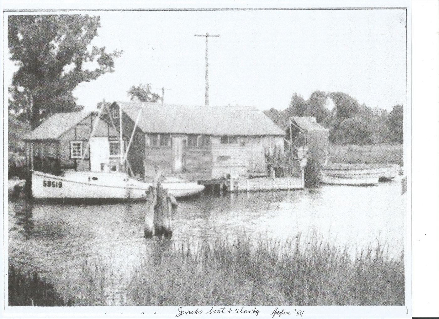 1954 snapshot of a shanty and boat at Apponaug Cove